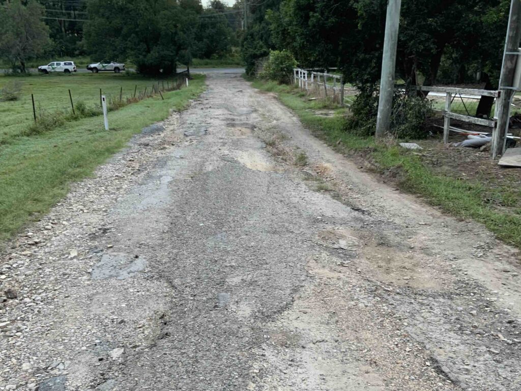 An image of a washed out driveway.